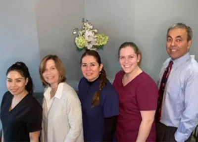 Mehran Haidari, DMD and the Clayton Dental Group staff