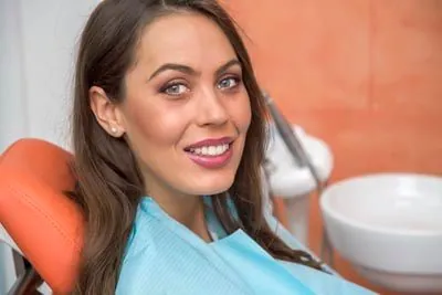 patient smiling after getting dental veneers at Clayton Dental Group in Concord, CA
