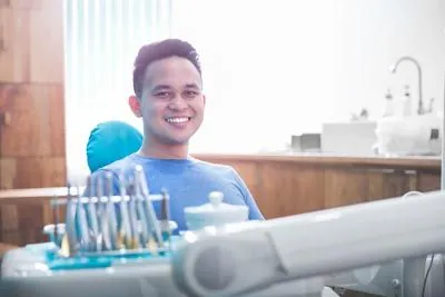 frenectomy patient smiling at Clayton Dental Group